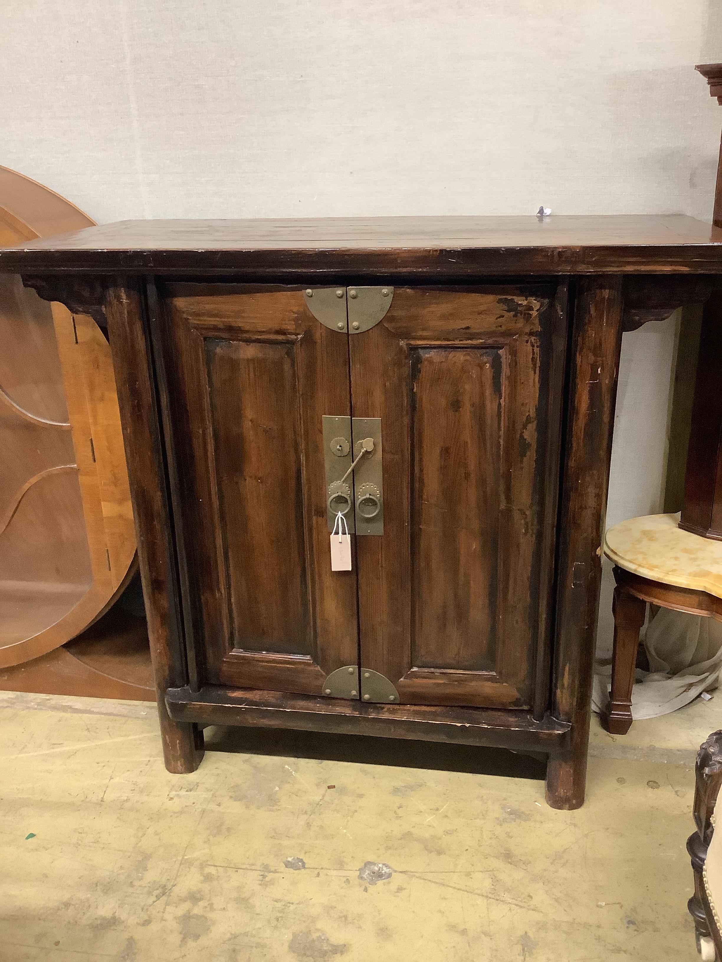 An India Jane Chinese pine two door side cabinet, width 120cm, depth 55cm, height 107cm